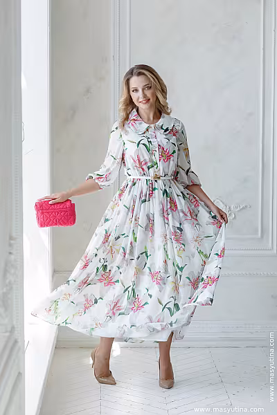 Платья